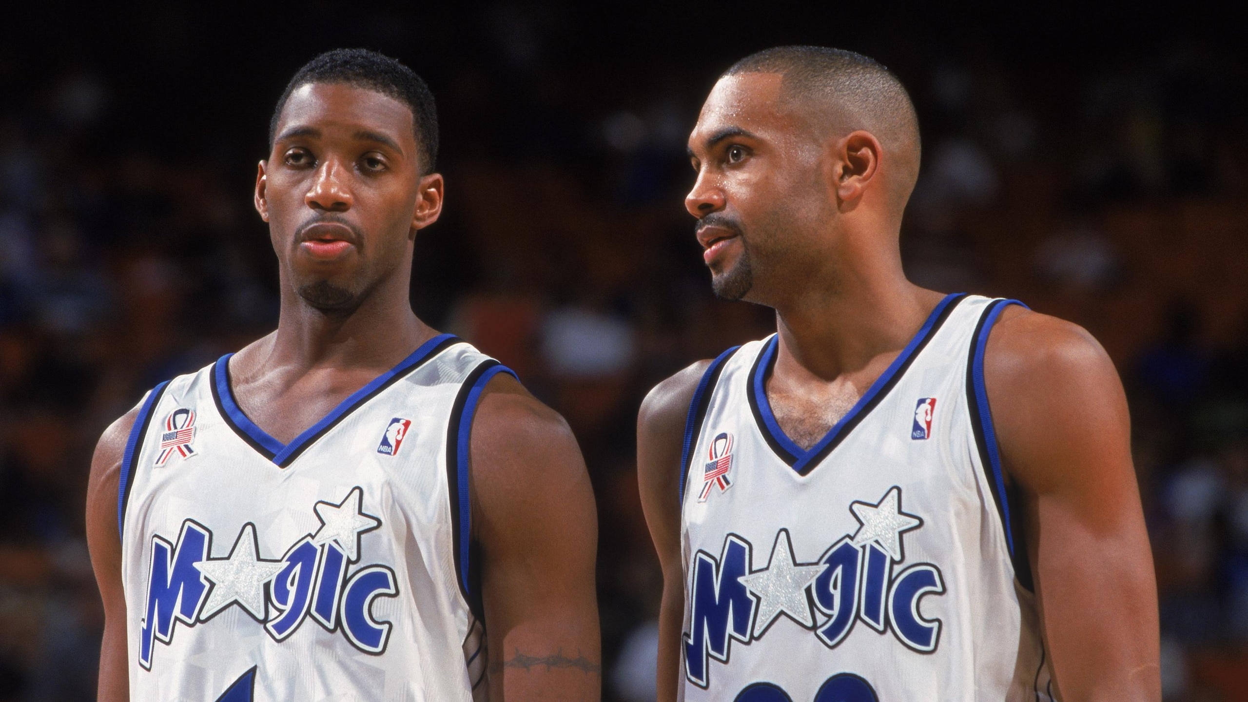 Tracy McGrady talks to Grant Hill Tracy McGrady talks to Grant Hill
