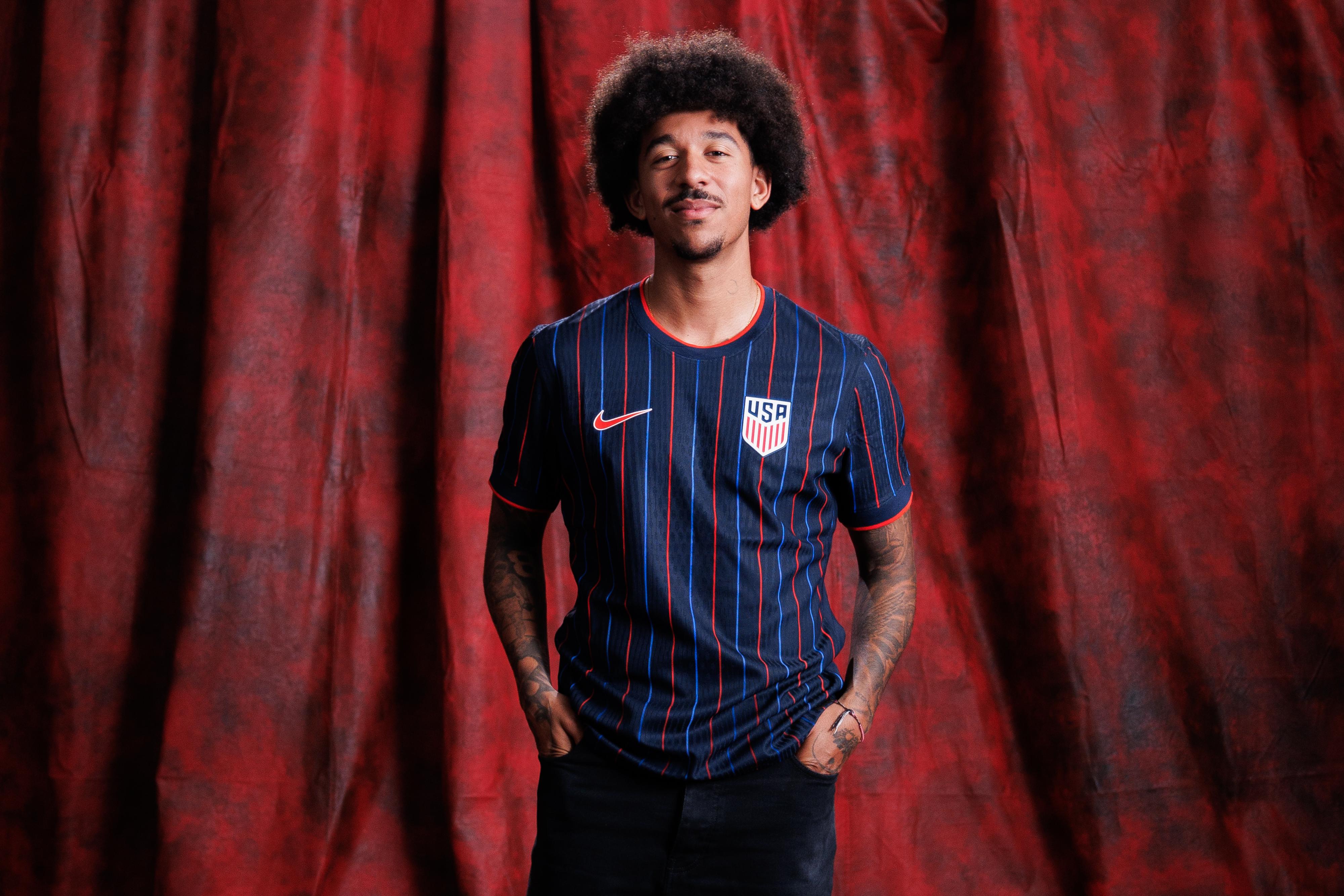 Chris Richards displays the United States away shirt