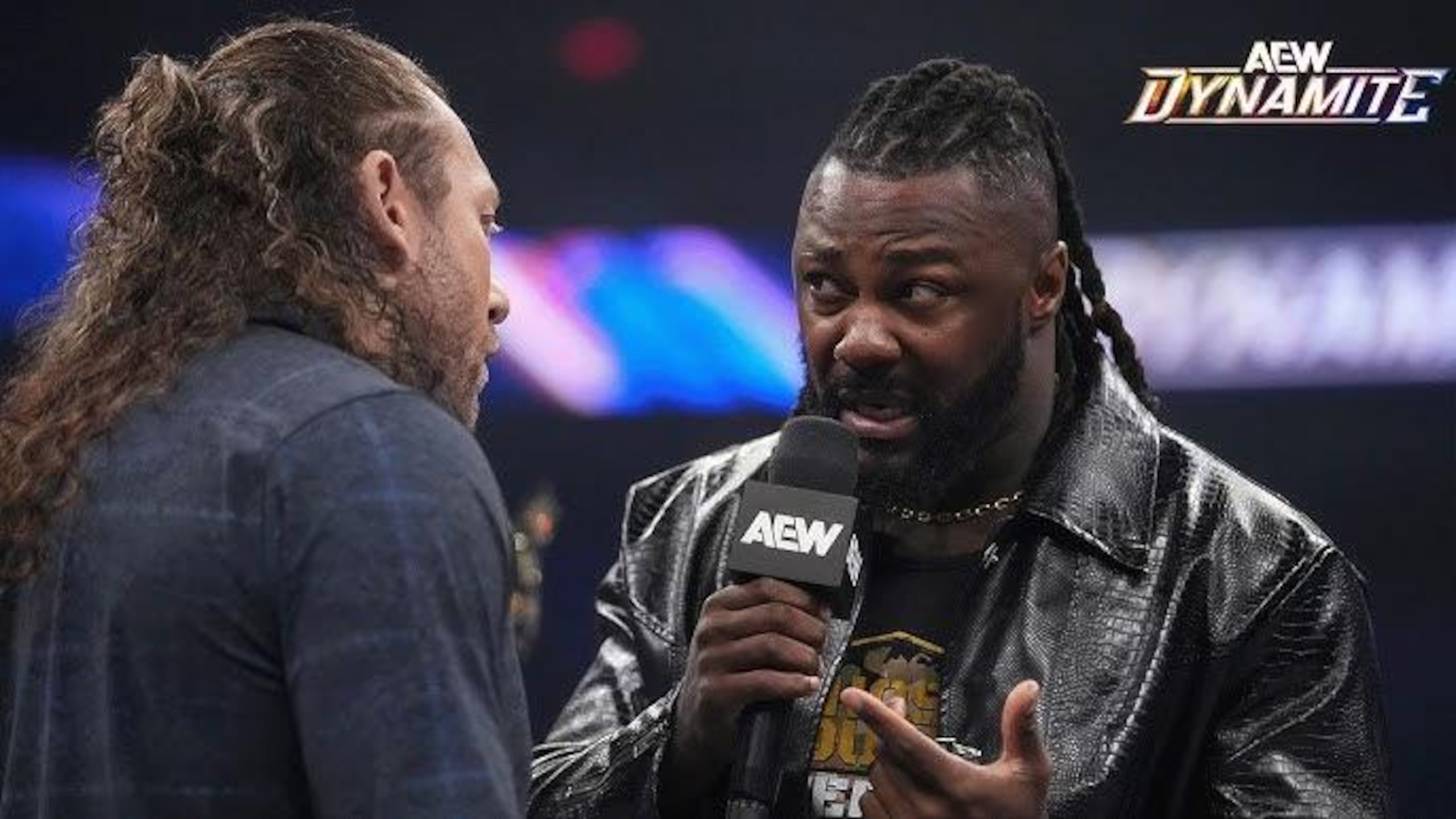 Swerve Strickland talking to Kenny Omega